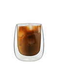 Clear glass with iced coffee on a white background