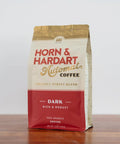 Horn & Hardart coffee bag on a wooden surface with a white background