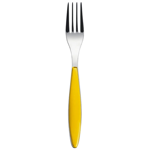 Spoon with yellow handle on a white background
