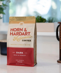 Horn & Hardart coffee bag on a table with a blurred background