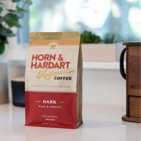 Horn & Hardart coffee bag on a table with a blurred background