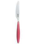 Knife with a red handle on a white background