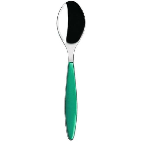 Spoon with a green handle on a white background