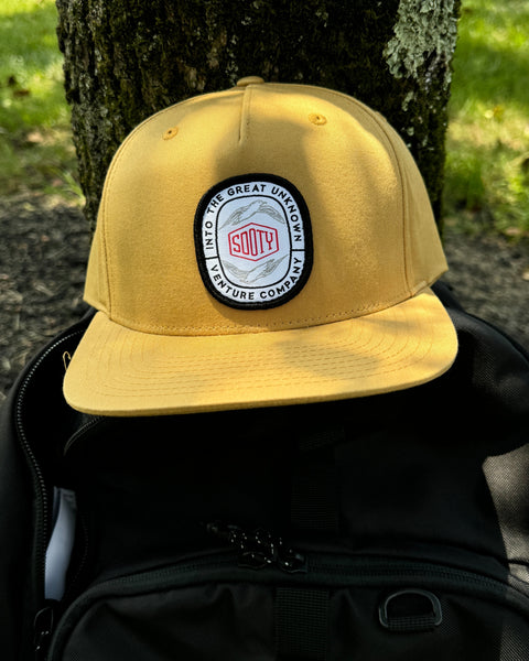 Biscuit Destination Unknown Patch Pinch Front Hat - Sooty Venture Co.