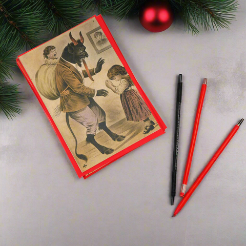 Krampus With Praying Child Greeting Card