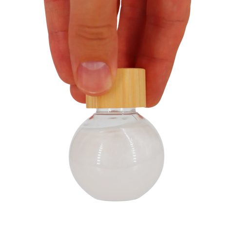 Sun Veil Liquid Bath Bomb - Orange Zest and White Oak