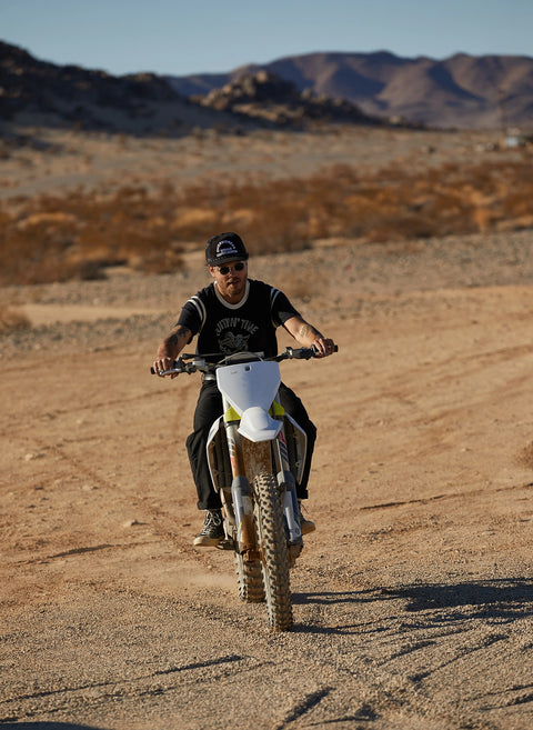 Overworked Under Caffeinated Trucker Hat by Pyknic