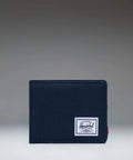 Navy blue wallet with a brand label on a gray background