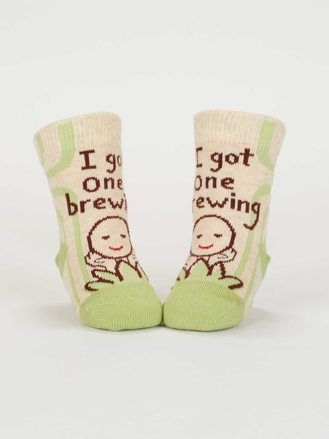 The Camera Loves Me/ I Got One Brewing Baby Socks